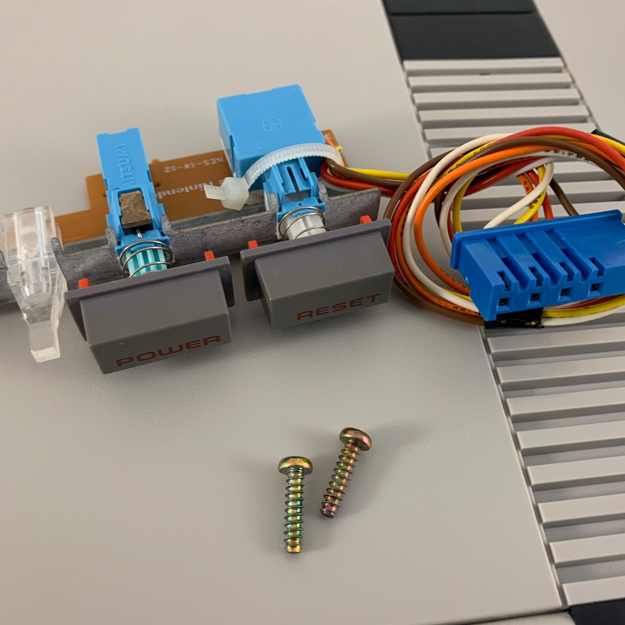 Original Nintendo NES Power and Reset Buttons