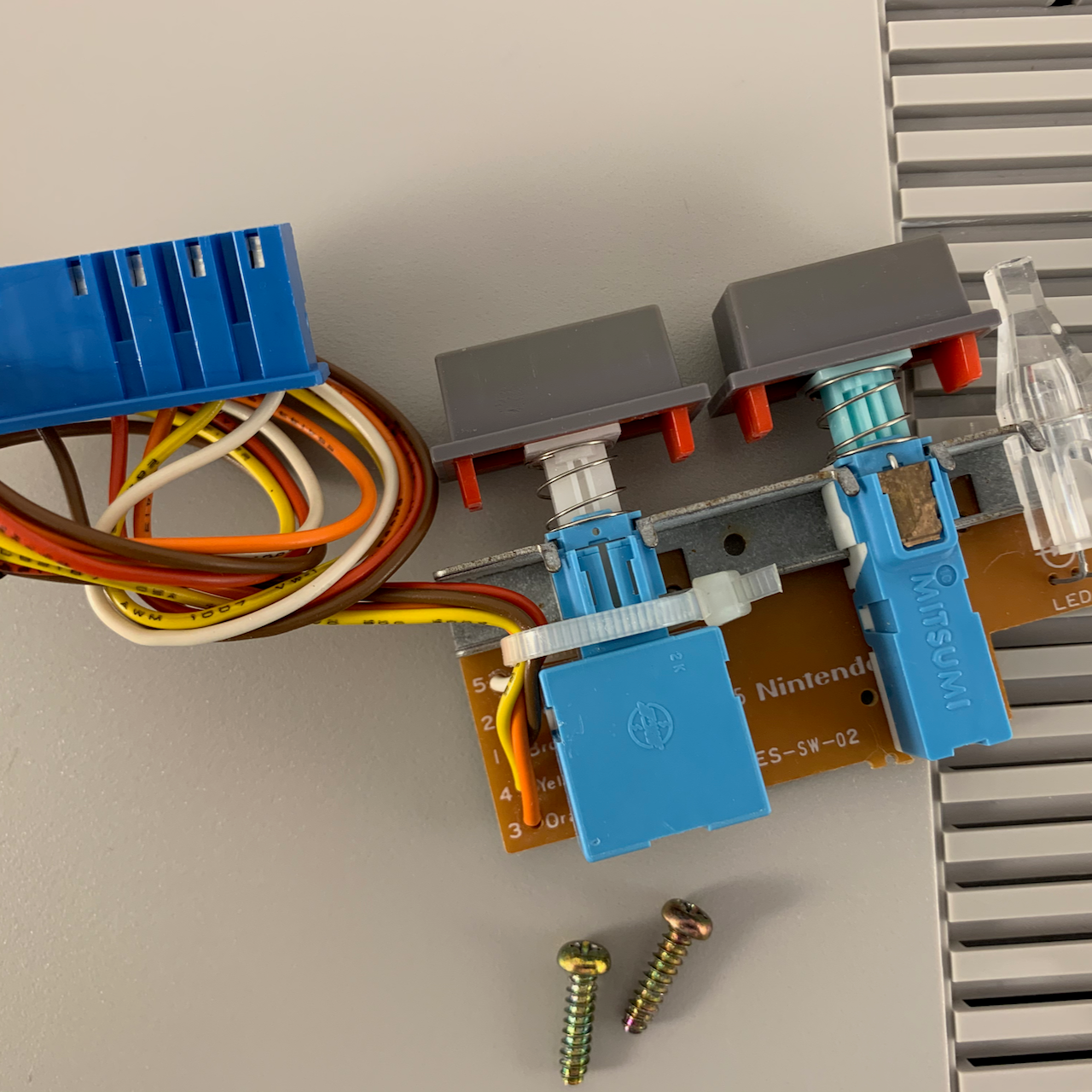 Original Nintendo NES Power and Reset Buttons
